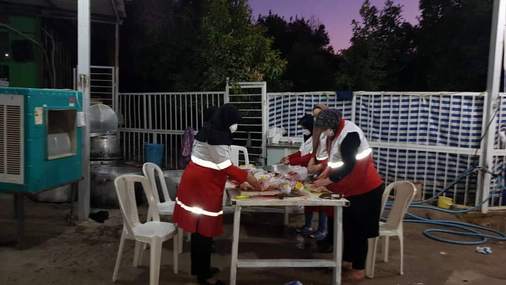 مشارکت اعضای جمعیت هلال احمر شهرستان دزفول با گروه جهادی خادمان شهدا