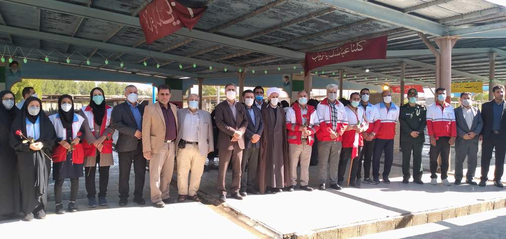 تجدید میثاق جوانان هلال احمر و غبارروبی گلزار شهدای امیدیه در دهه فجر انقلاب اسلامی