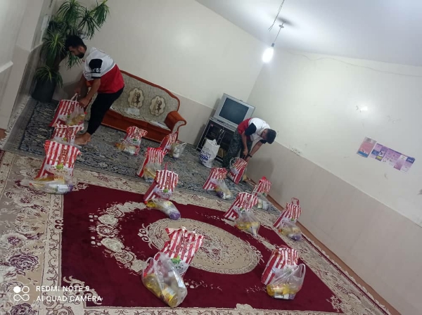 بسته های معیشتی میان نیازمندان مسجدسلیمان توسط داوطلبان هلالاحمر توزیع شد